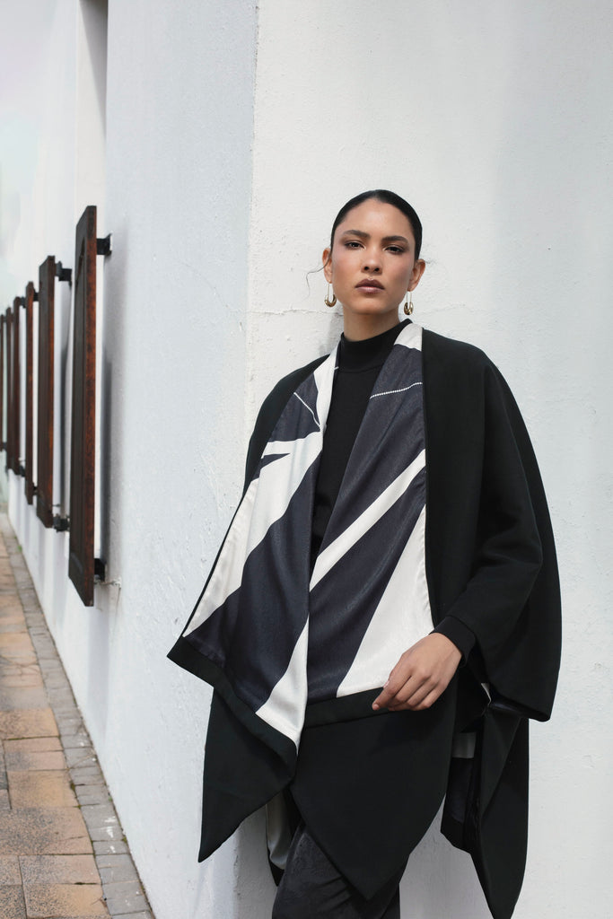 Amy Reversible Poncho: Fama Noir – Nubian Hueman