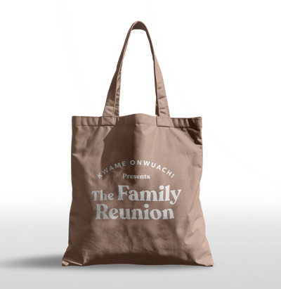 Brown tote bag with white text on a light gray background