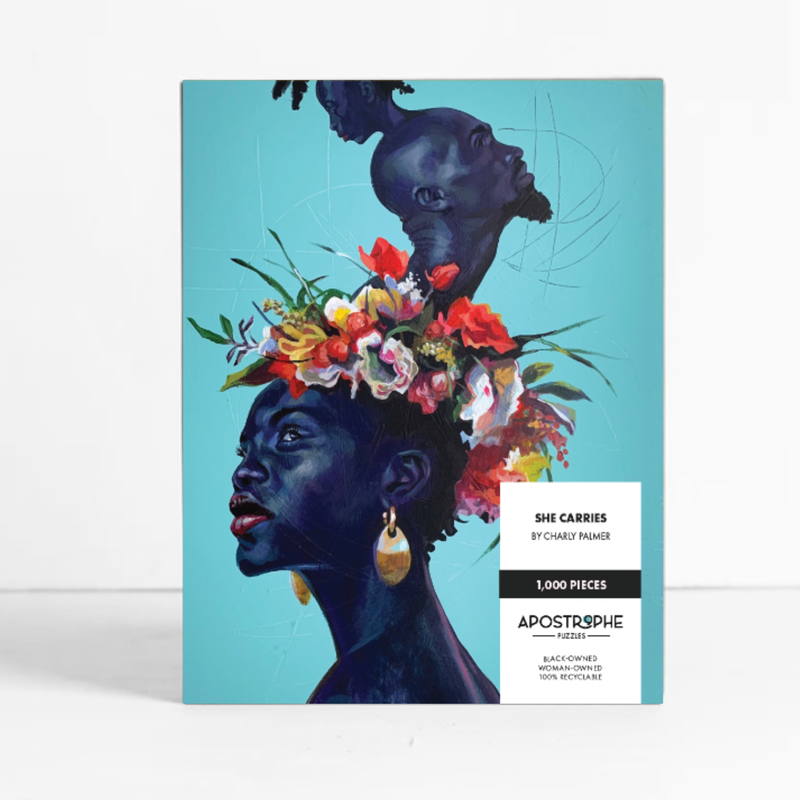 Puzzle box with artistic design of a woman with flowers and &